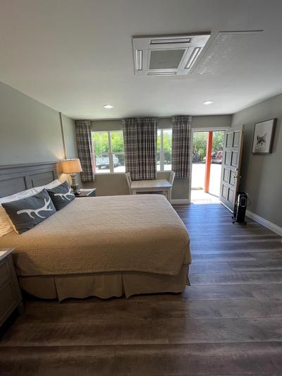 Big Bear Frontier | Big Bear Lake, California | bed with door going outside