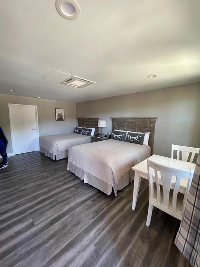 Big Bear Frontier | Big Bear Lake, California | two beds in room with table