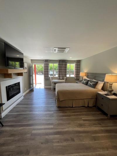 Big Bear Frontier | Big Bear Lake, California | Bedroom, table and tv