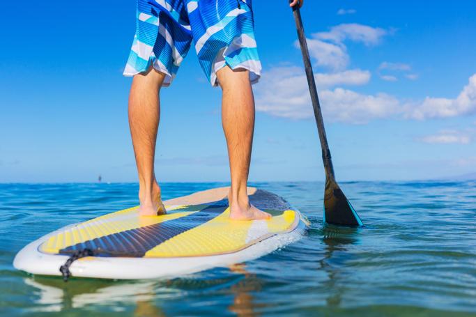 Big Bear Frontier | Big Bear Lake, California | Man standing on paddleboard on water