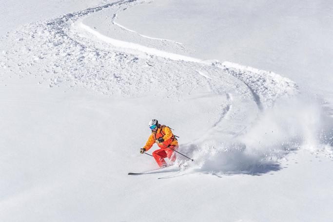Big Bear Frontier | Big Bear Lake, California | Person skiing downhill and disrupting snow